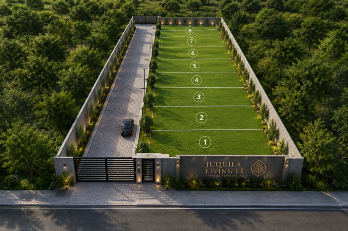 Vista aérea del residencial: la franja de ocho lotes verdes alineados sobre la calle interna pavimentada, muros perimetrales con luminarias y el acceso con el nombre del desarrollo al frente